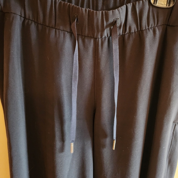 Lululemon black on the fly full length Pants - Picture 11 of 12